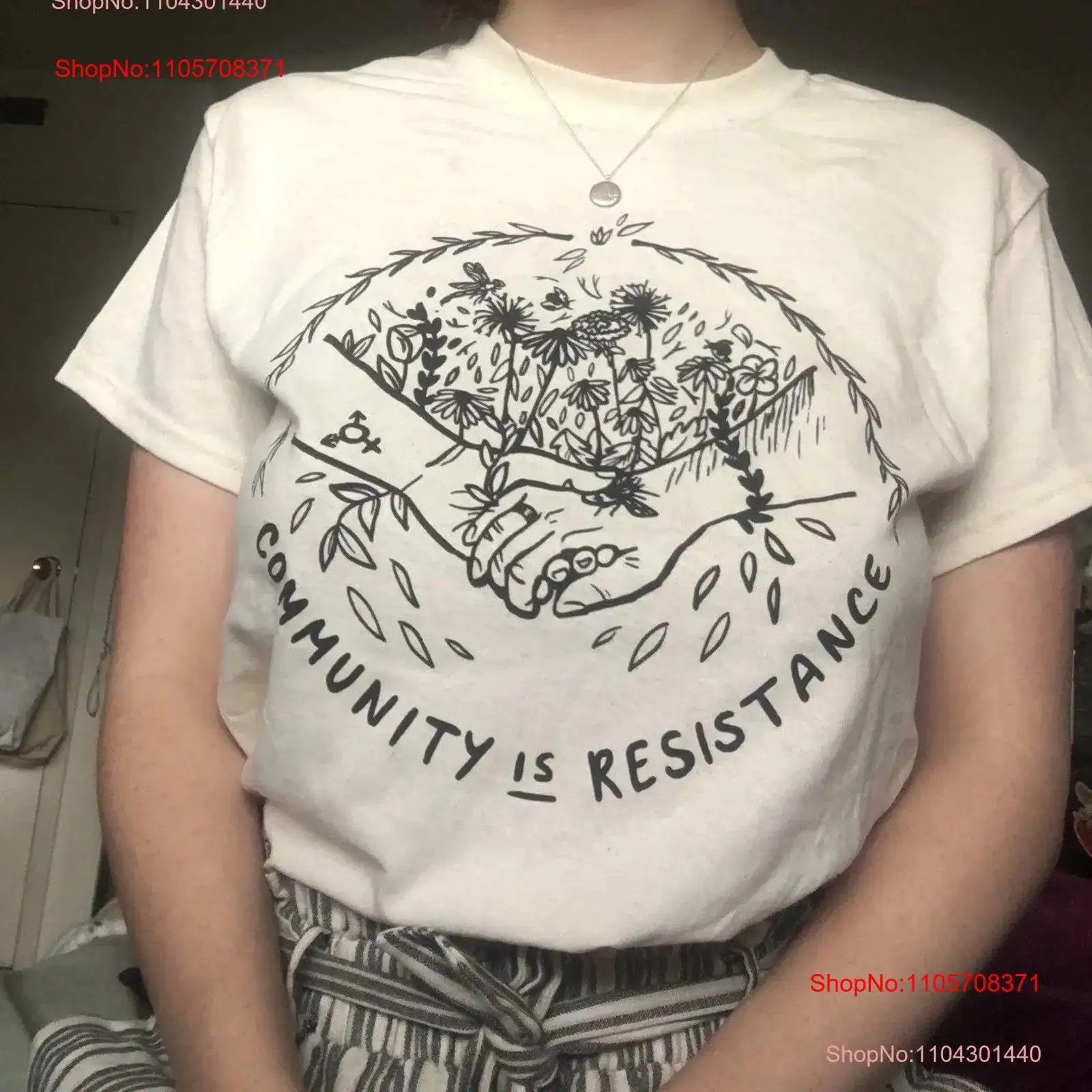 community is resistance T Shir - огляд і ціна Vintage Fashion Community